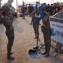 Boryeong Mud Festival Rotolarsi Fango Corea Sud